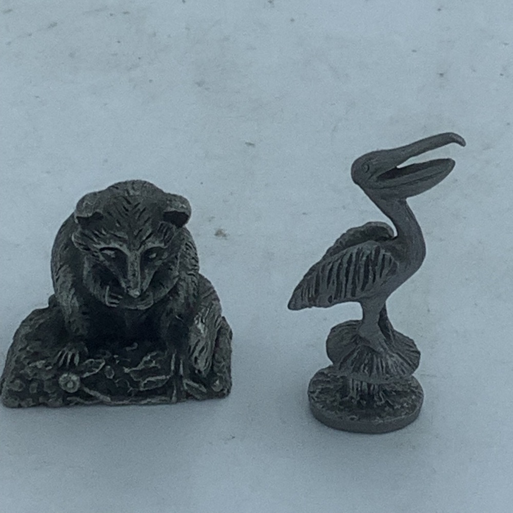 Two Pewter Miniature Animal Figurines- Raccoon and Pelican